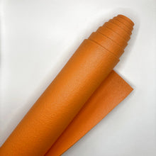 Laden Sie das Bild in den Galerie-Viewer, Yogamatte Studio 4,5mm Ökotex orange gerollt im Sotantar Yoga Shop Berlin