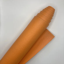 Laden Sie das Bild in den Galerie-Viewer, Yogamatte Studio 4,5mm Ökotex orange gerollt im Sotantar Yoga Shop Berlin