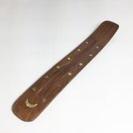 Räucherstäbchenhalter aus Holz mit eingearbeitetem Mond und Sternen  im Sotantar Yoga Shop, Berlin